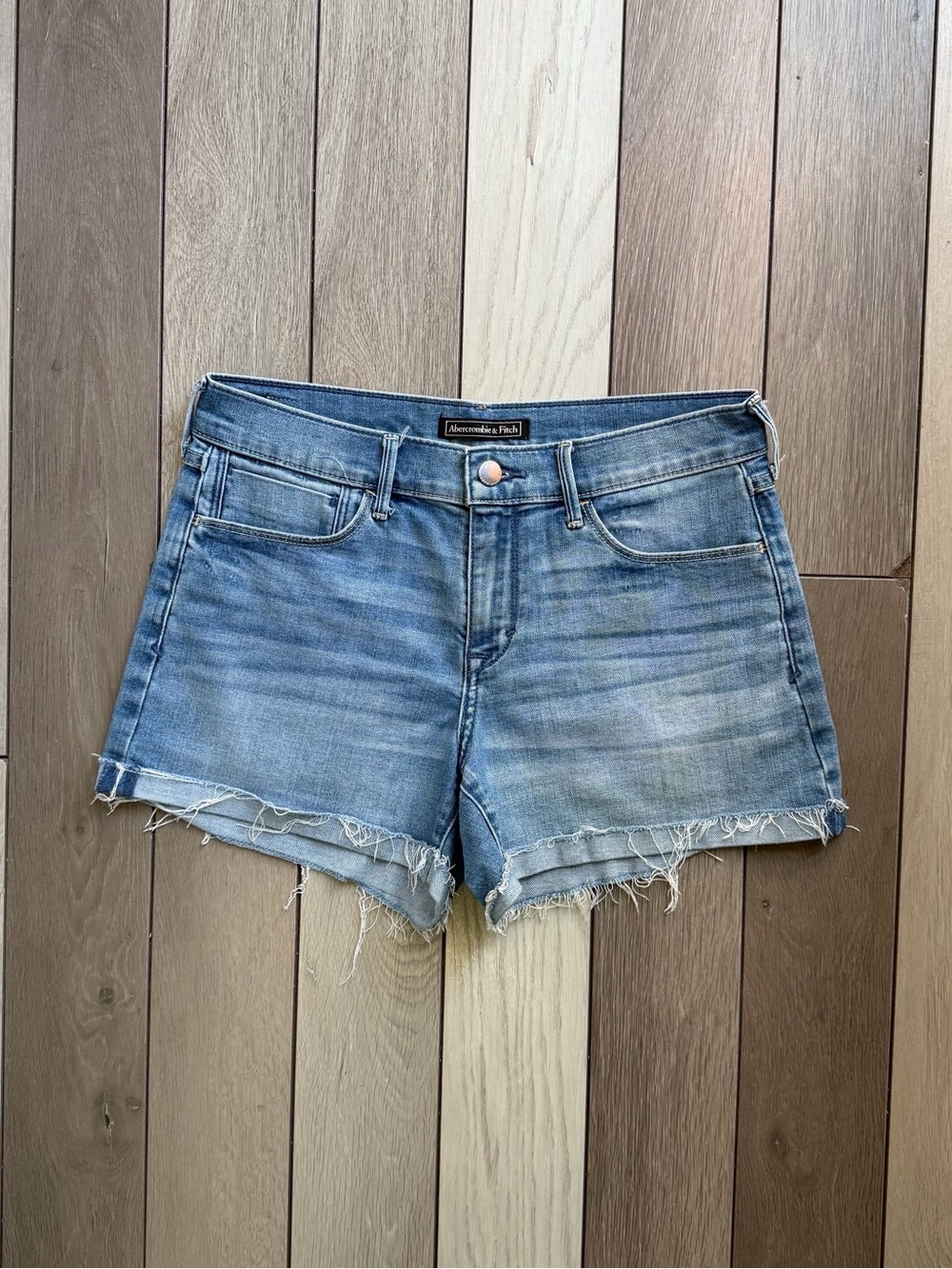 Abercrombie & Fitch women's blue cut-off denim shorts.